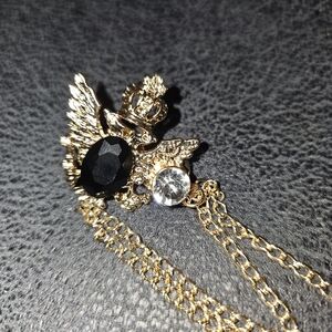 Elegant Gold and Black Winged Brooch With Attached Rhinestone